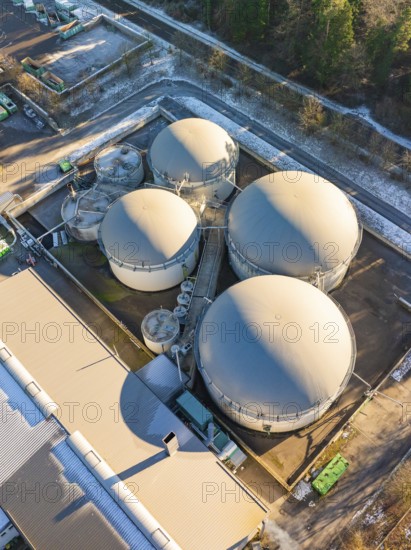 Aerial view of large industrial tank facilities in a snowy environment, Neubulach, Black Forest, Germany, Europe