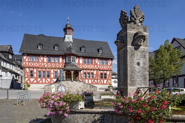 Historic town hall, Renaissance half-timbered house, fountain for fallen soldiers of the 1st World War, Untermarkt, old town centre, Hadamar, Limburg-Weilburg, Westerwald, Hesse, Germany, Europe