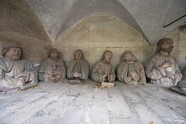 Detail of the figurative depiction of the Last Supper, Jesus with his twelve disciples, in an exterior chapel on the east choir of the late Gothic St George's Church, Dinkelsbühl, Bavaria, Germany, Europe