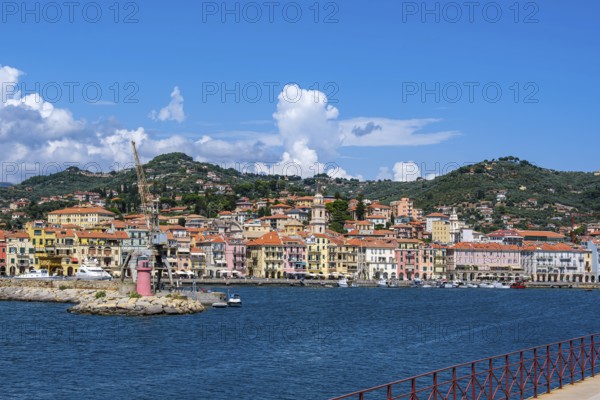 View from the Long Pier of the picturesque row of houses on the harbour in the Oneglia district of Imperia, Liguria, Italy, Europe