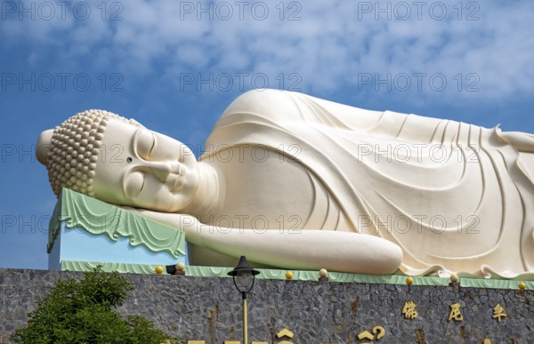 Reclining Buddha statue, Vinh Trang Temple, My Tho, Mekong Delta, Vietnam, Asia