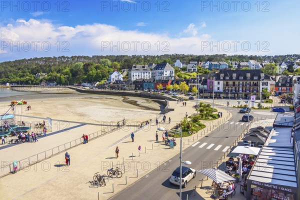 Aerial view at the boardwalk and city street with walking people and cars in Morgat, a coast village on the france west coast a sunny summer day, Crozon peninsula, Morgat, Bretagne, France, Europe