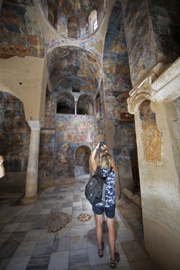 Church frescoes in the Byzantine ruined city of Mystras or Mistra on the Taygetos Mountains, UNESCO World Heritage Site, Laconia, Peloponnese, Greece, Europe