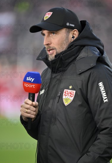 Coach Sebastian Hoeneß VfB Stuttgart Portrait in interview Microphone Microphone Logo SKY MHPArena, MHP Arena Stuttgart, Baden-Württemberg, Germany, Europe