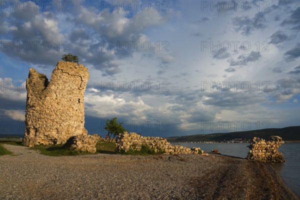 Old ruin by the sea at sunset under a cloudy blue sky, Vecka kula, Vecka Kula, Starigrad, Starigrad-Paklenica, Zadar, Croatia, Europe