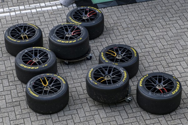 Pirelli P Zero racing tyres Car tyres for GT series race cars are in front of entrance of pit box at car races, TT Circuit Assen, Assen, province of Drenthe, Netherlands