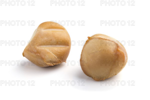 Piece of smoked cheese isolated on white background. Side view, close up