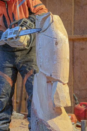 Wooden sculpture with chainsaw