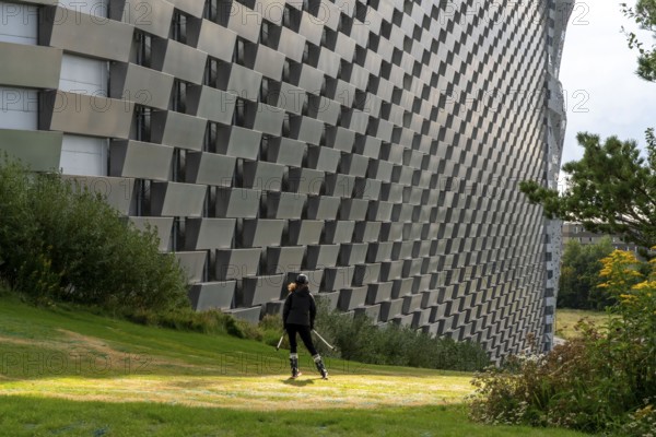 CopenHill, waste incineration plant and artificial ski slope, skiing with a view of the ski lift, 90 metres high and 400 metres long slope on artificial turf, Copenhagen, Denmark, Europe