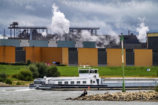 Thyssenkrupp Steel steelworks in Duisburg-Bruckhausen, thyssenkrupp Steel Europe AG, hot strip mill II Rhine, cargo ship, Duisburg, North Rhine-Westphalia, Germany, Europe