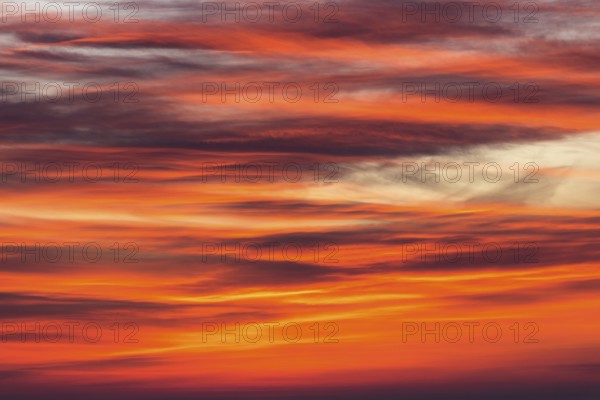 Orange-red coloured cloudy sky after sunset, cloud formation, evening sky, sunset, Baden-Württemberg, Germany, Europe