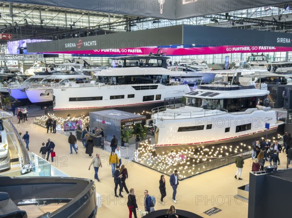 View from elevated position in exhibition overview of exhibition hall public fair fair boot Düsseldorf with luxury yachts superyachts ships boats, Düsseldorf, North Rhine-Westphalia, Germany, Europe