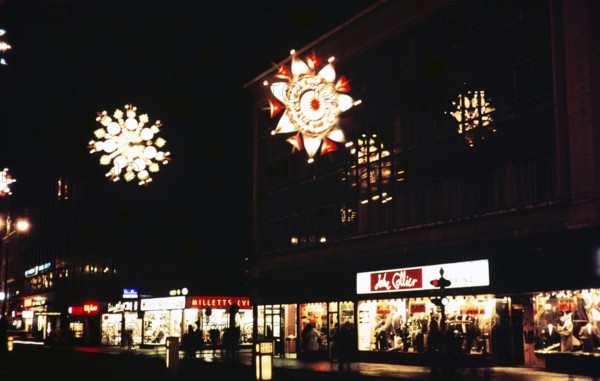 Christmas lights at night on Oxford Street in the centre of London, England, United Kingdom, December 1960, Europe