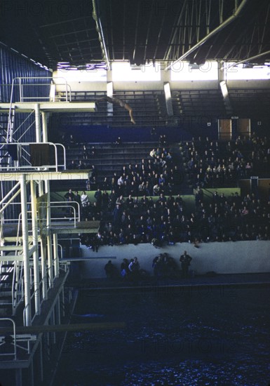 Crowds in the swimming pool during high diving at the Summer Olympics, Melbourne, Australia, 1956, Oceania