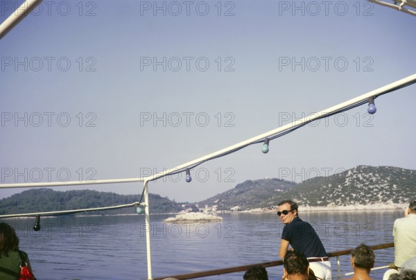 Boat approaching thought to be Korcula, Dalmatian Coast, Croatia, former Yugoslavia, Europe 1970, Europe