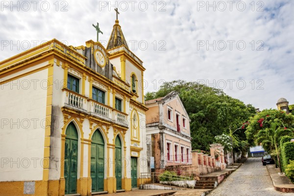 Slope in the city of Olinda with historic church and colonial-style houses (Editado), Olinda, Pernambuco, Brazil, South America