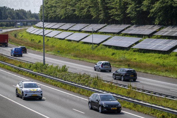 A58 motorway, photovoltaic systems were installed on the slopes to the side of the carriageway, use of the areas along the roads as a solar park, near Etten-Leur, Noord-Brabant, Netherlands