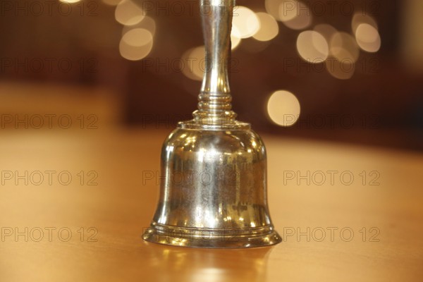 Close-up of a hand bell used, for example, in meetings, committees or courtrooms (here: council chamber of the municipality of Mutterstadt, Rhineland-Palatinate)