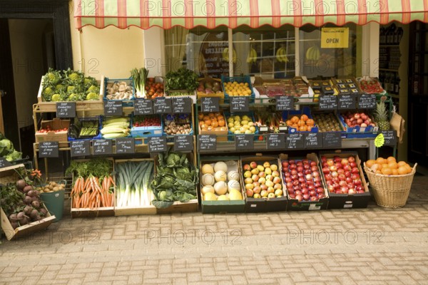 Display of fresh vegetables outside greengrocers shop, Halesworth, Suffolk, England, United Kingdom, Europe