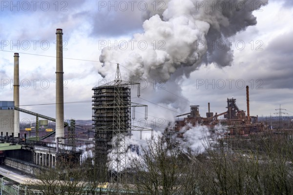 The Thyssenkrupp Steel steelworks in Duisburg-Marxloh, on the Rhine, quenching tower of the coking plant, blast furnaces 1 and 2, right, North Rhine-Westphalia, Germany, Europe