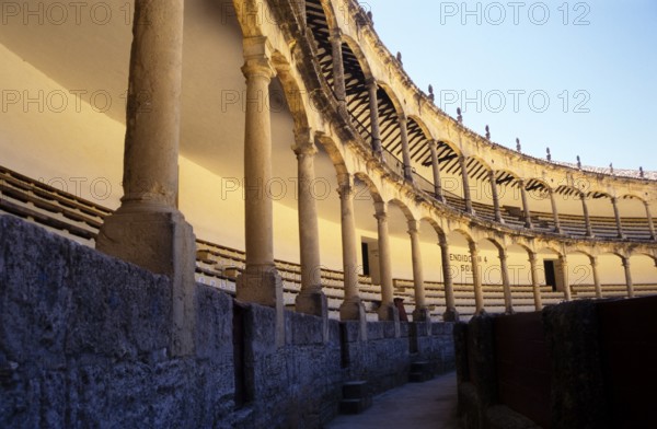 Detail of the seating and architecture inside the bullring in Ronda, Andalusia, Spain, Europe