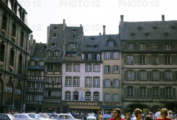 Historic medieval half-timbered buildings on the Place de la Cathedrale, city centre of Strasbourg, Alsace, France 1974