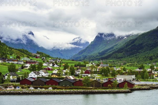 Mountains and Fjord over Norwegian Village, Olden, Innvikfjorden, Norway, Europe