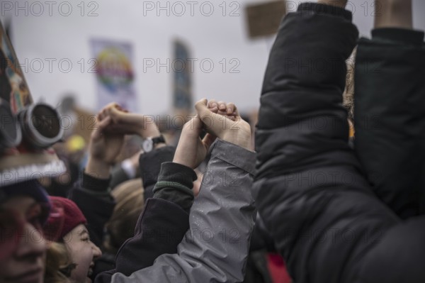 150, 000 people gather around the Bundestag in Berlin to build a human wall against the shift to the right in society. We are the firewall chanted demonstrators from a wide range of social groups. Recordings on 03.02.2024 in Berlin