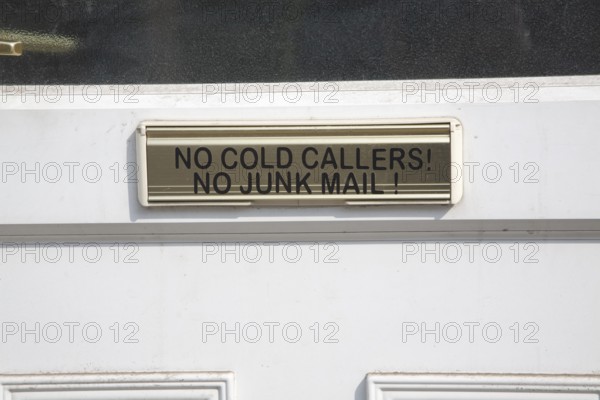 Notice on house letter box 'No cold callers no junk mail, UK