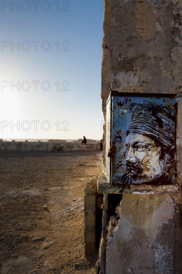 Fortress wall with picture of Jimi Hendrix, evening mood in the harbour town of Essaouira, Morocco, Africa