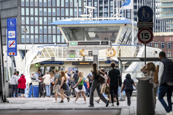 GVB ferries for pedestrians and cyclists across the river Ij, at Amsterdam Centraal station, free of charge, to the eastern parts of the city, Netherlands