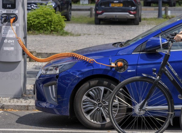 Electric car at the charging station, Berlin, Germany, Europe