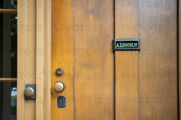 Springfield, Illinois, The Lincoln Home National Historic Site preserves the home and neighborhood where Abraham Lincoln lived before he became the 16th president of the United States. A nameplate is on the door of Lincoln's home