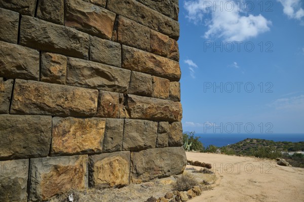 Ancient ruined wall in dry landscape overlooking the sea on a sunny day, Palaiokastro, Ancient fortress, 3rd and 4th century BC, above Mandraki, Nisyros, Dodecanese, Greek Islands, Greece, Europe