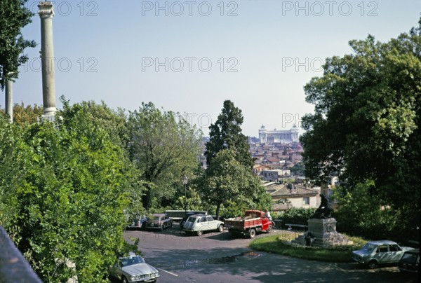 View over the roofs of the city to the Altar of the Fatherland, Altare della Patria, Rome, Italy, 1974, Europe