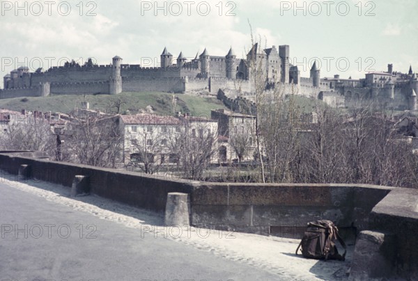 View of hilltop castle medieval citadel Carcassonne, France c 1960 fortified city department of Aude, region of Occitanie