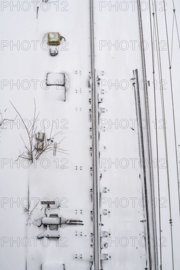 Onset of winter with lots of fresh snow and temperatures below -5 degrees during the day, railway line between Essen and Bochum, except for a few regional connections, all trains cancelled at times, snow-covered railway facilities, electronic points, near Essen, North Rhine-Westphalia, Germany, Europe