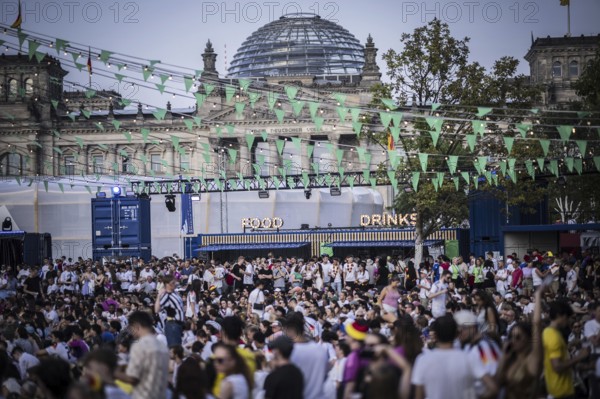 Scenes in the fan zone on Platz der Republik in front of the Reichstag building taken in Berlin, 29 June 2024 during the broadcast of the football match between Denmark and Germany