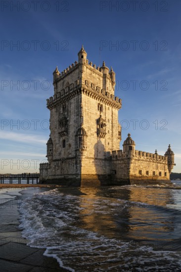 Belem Tower or Tower of St Vincent, famous tourist landmark of Lisboa and tourism attraction, on the bank of the Tagus River Tejo on sunset. Lisbon, Portugal, Europe