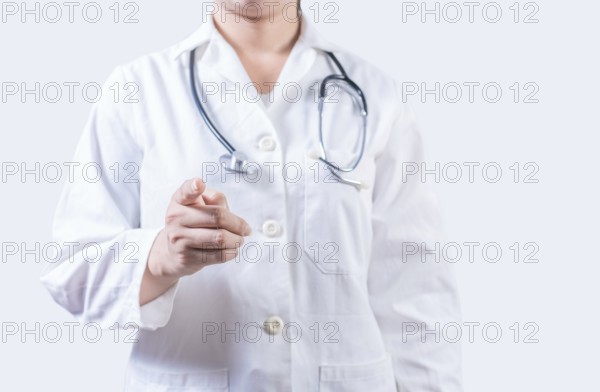 Unrecognizable doctor pointing at the camera. Doctor hands pointing at you isolated, Finger doctor pointing at you