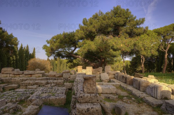 HDR Photo, Remains of Athena Polias Temple, Ancient ruins of stone, surrounded by trees, under blue sky during the day, Filerimos, hill not far from Rhodes town, Ancient State of Ialyssos, Rhodes, Dodecanese, Greek Islands, Greece, Europe