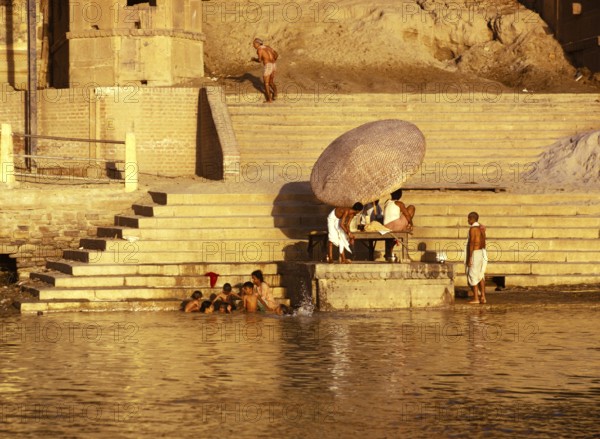 Hindus bathing in the holy river Ganges in Varanasi, India, 1974, Asia