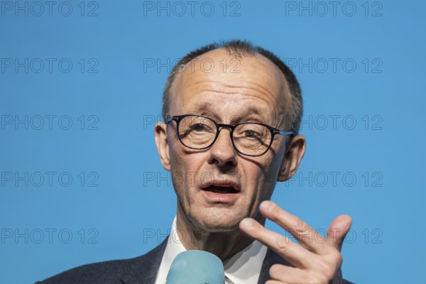 New Year's reception of the CDU with chancellor candidate Friedrich Merz in Künzelsau. The Federal Chairman of the CDU and Chairman of the CDU-CSU parliamentary group spoke to an audience of 2000 at the Carmen Würth Forum. Portrait during his speech on stage. Künzelsau, Baden-Württemberg, Germany, Europe