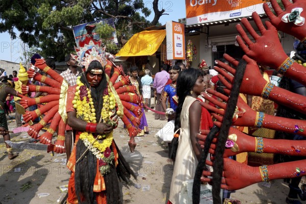 People dress as Hindu Goddess Kali near Mutharamman temple, Tamil Nadu, India, Asia