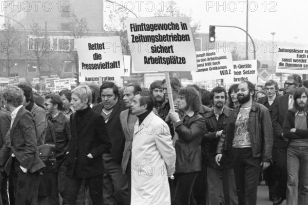 Several hundred journalists and employees of the publishing houses of the newspapers WAZ (Westdeutsche Allgemeine Zeitung) and NRZ (Neue Ruhr-Zeitung) took to the streets in Essen on 27 October 1975 in protest against the merger out of concern for their jobs and press freedom, Germany, Europe