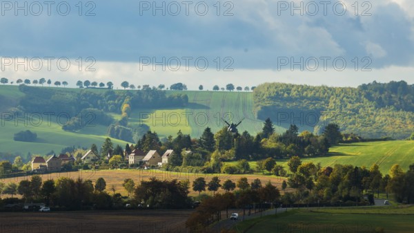 Autumnal field landscape near Possendorf with windmill in the Eastern Ore Mountains