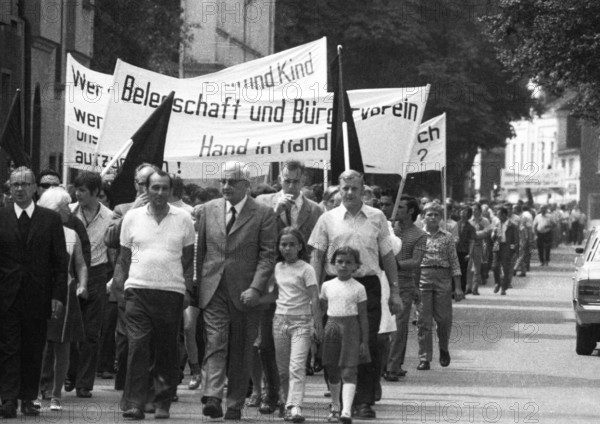 With black flags, mourning and anger, workers of Delog, a factory for flat glass, demonstrated in Gelsenkirchen on 13 July 1971 for the preservation of their jobs