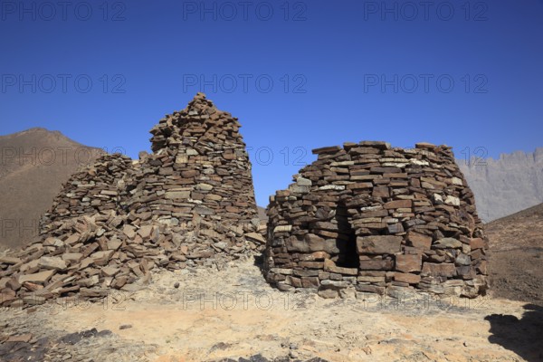 The beehive tombs of Al-Ayn are the most famous tombs in the area between the towns of Bat and Al-Ayn in the Hajar Mountains of Oman because of their good state of preservation and location on the edge of Jebel Misht (Ridge Mountain) . The tombs were inscribed on the Unesco World Heritage List in 1988