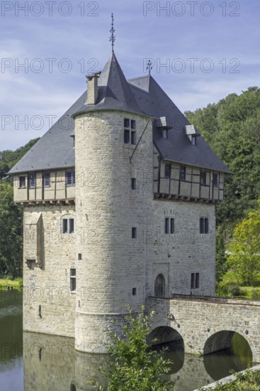 13th century Château des Carondelet, medieval moated donjon in the village Crupet, Assesse, province of Namur, Belgian Ardennes, Wallonia, Belgium, Europe