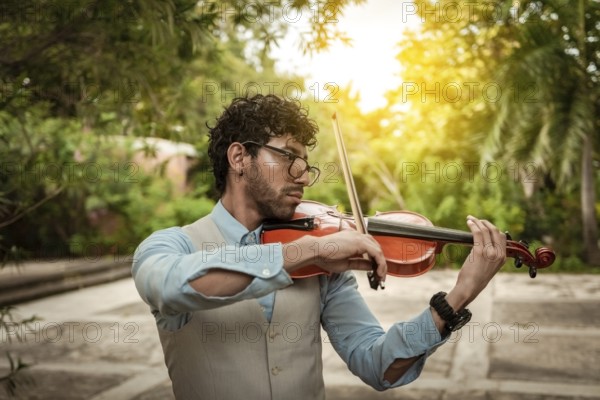 Portrait of man playing violin at sunset. Close up of violinist man playing in the street. Violinist artist playing a melody outdoors, Image of a person playing the violin outdoors